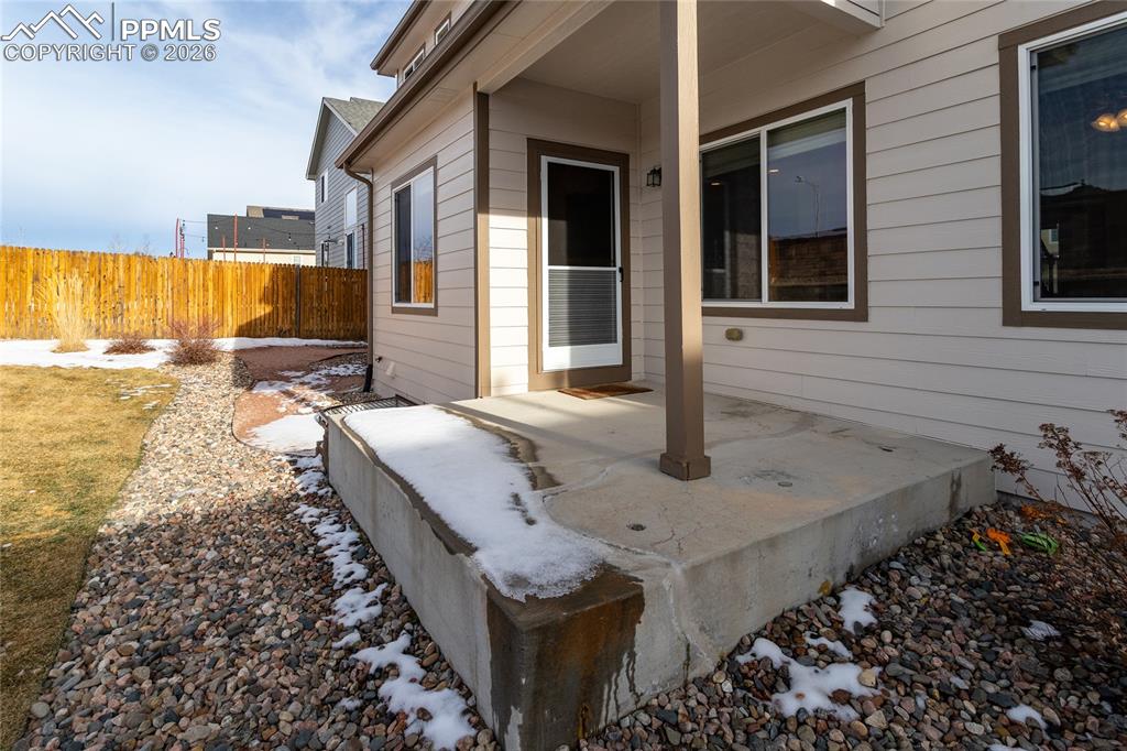 7160 Red Cardinal Loop Colorado Springs, CO 80908 - Photo 41 of 49 a view of a house with backyard