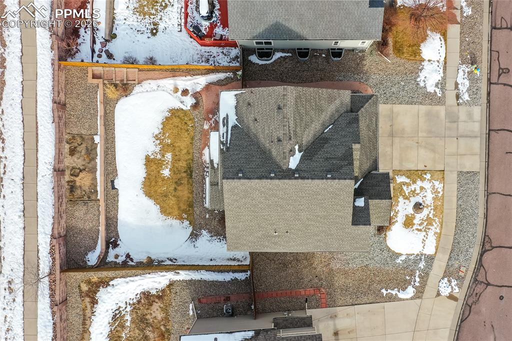 7160 Red Cardinal Loop Colorado Springs, CO 80908 - Photo 46 of 49 an aerial view of a house with outdoor space