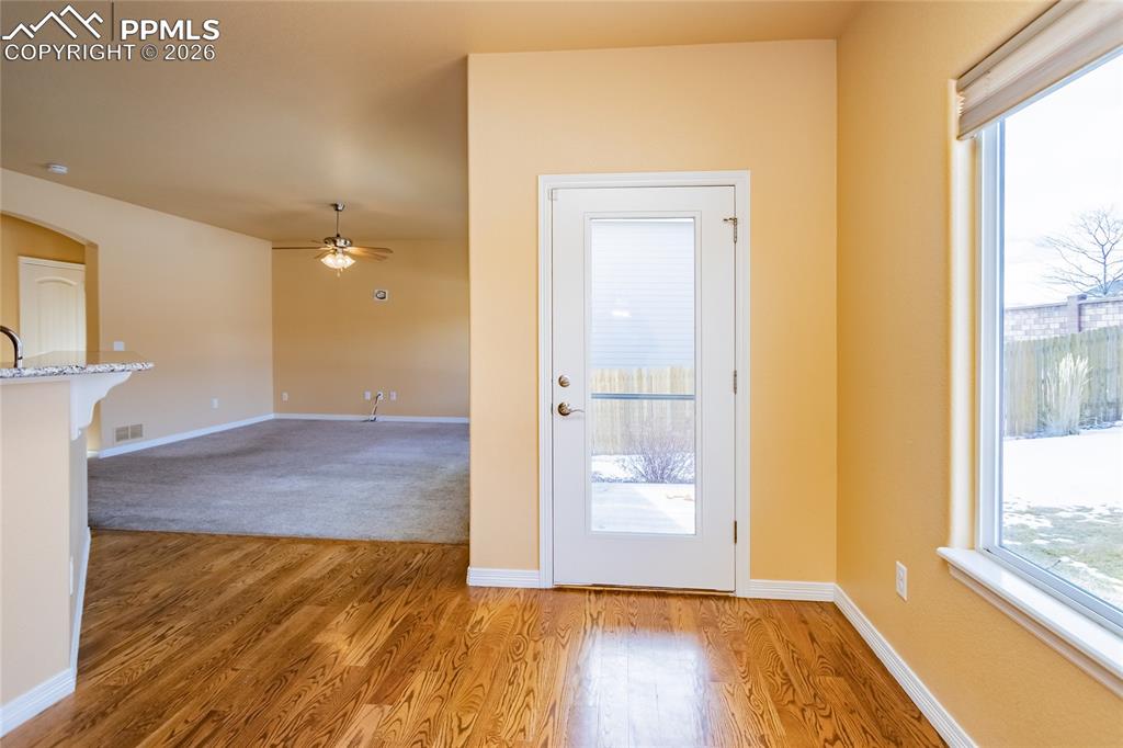 7160 Red Cardinal Loop Colorado Springs, CO 80908 - Photo 9 of 49 a view of hallway with a front door