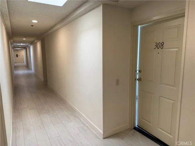 a view of hallway with livingroom