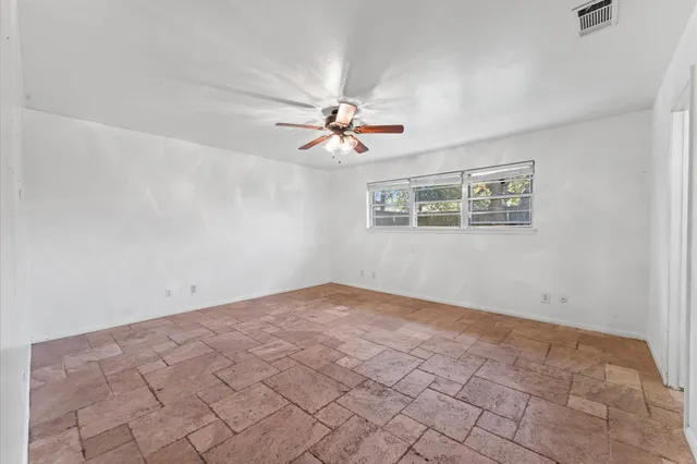 a bathroom with a sink a mirror and a bathtub