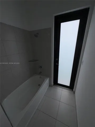 a bathroom with a bathtub