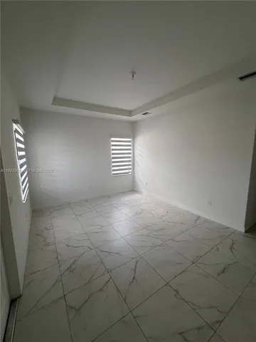 a view of a room with an empty space