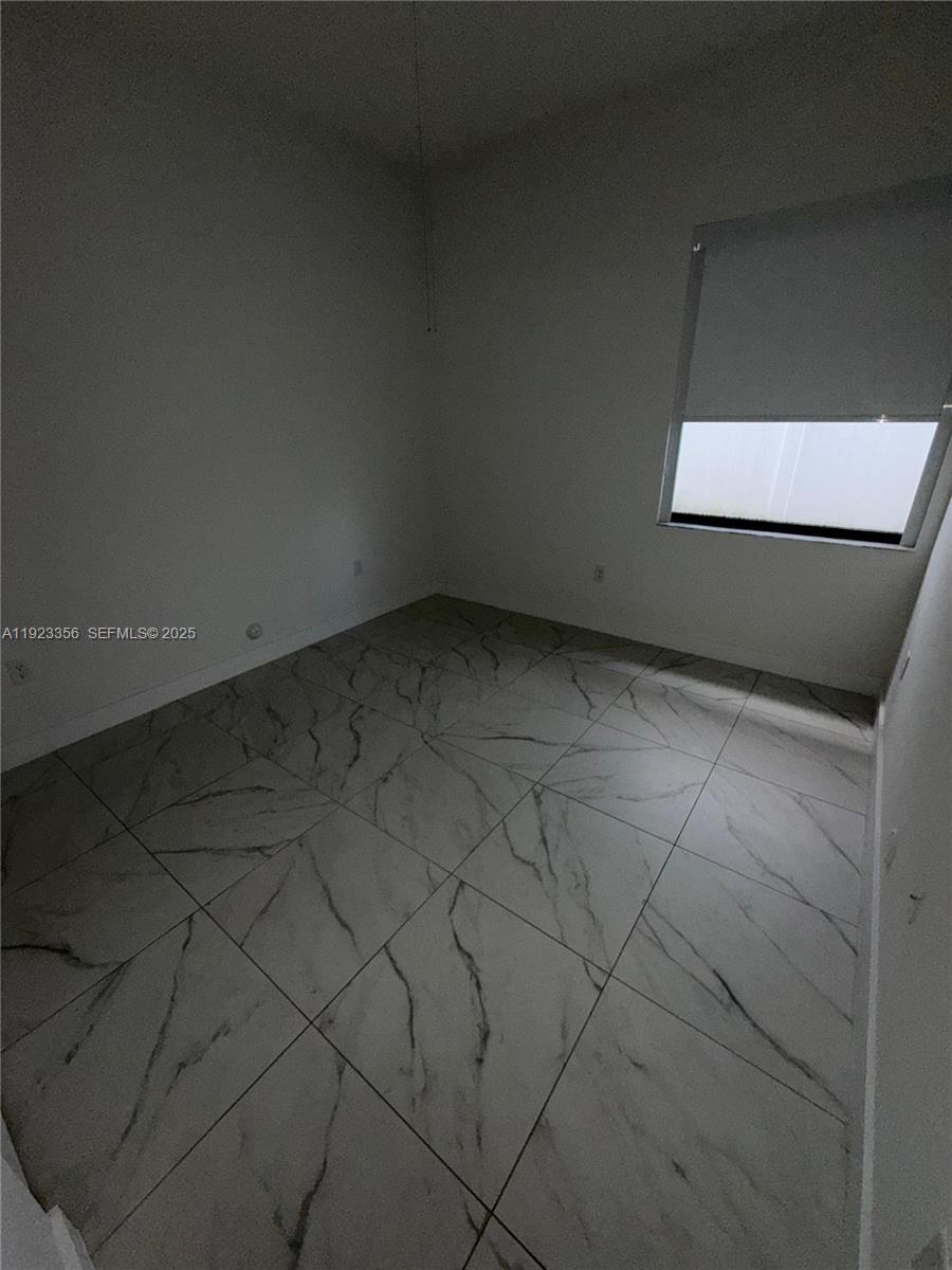 4321 Southwest 173rd Avenue Miramar, FL 33029 - Photo 8 of 28 a view of an empty room