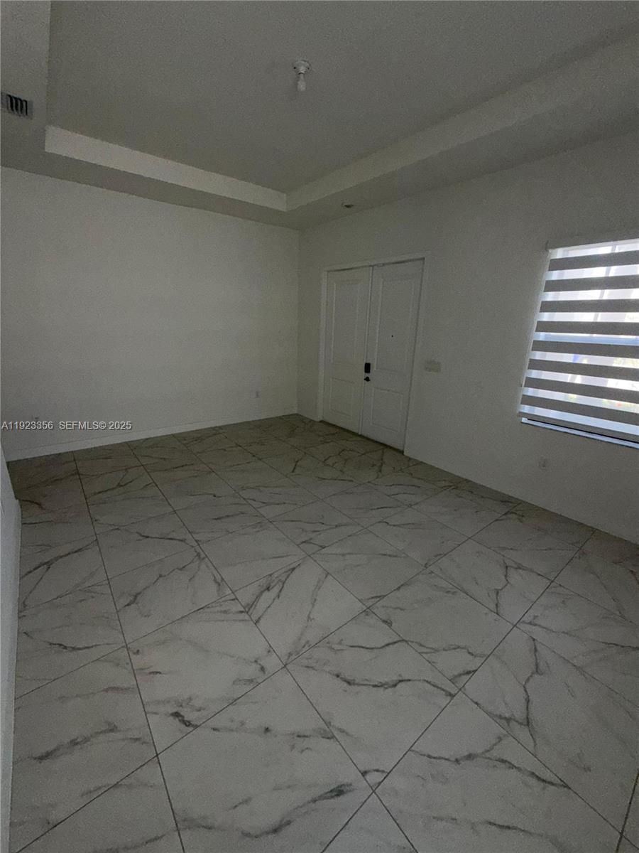 4321 Southwest 173rd Avenue Miramar, FL 33029 - Photo 9 of 28 a view of a room that has a window in it