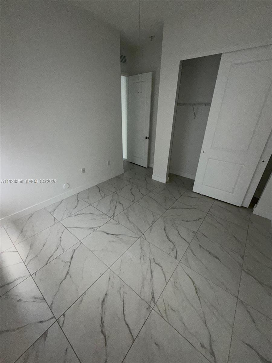 4321 Southwest 173rd Avenue Miramar, FL 33029 - Photo 10 of 28 a view of a room with white walls