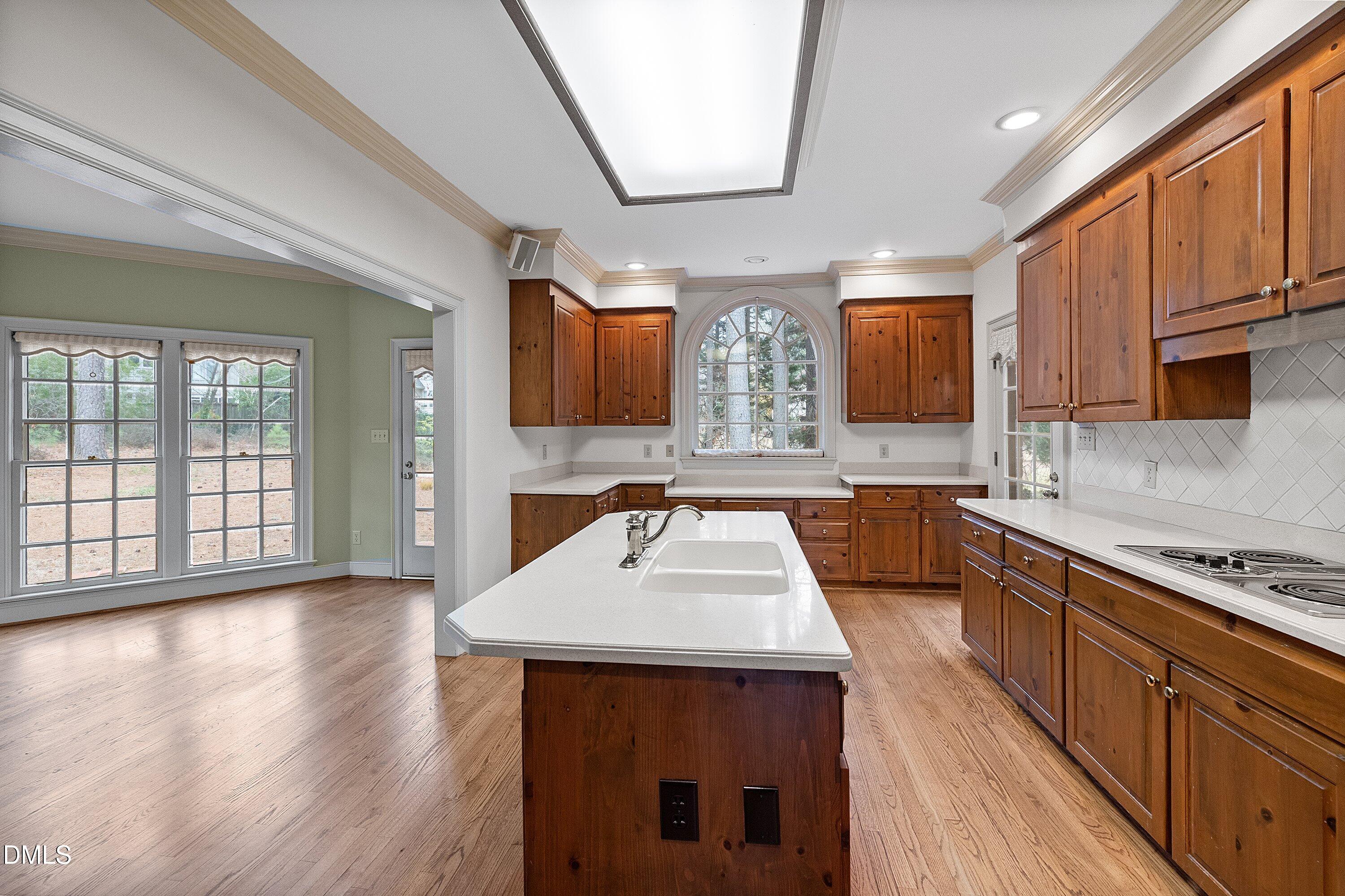 1708 Sawgrass Court Raleigh, NC 27615 - Photo 25 of 60 Island With Sink & Dishwasher
