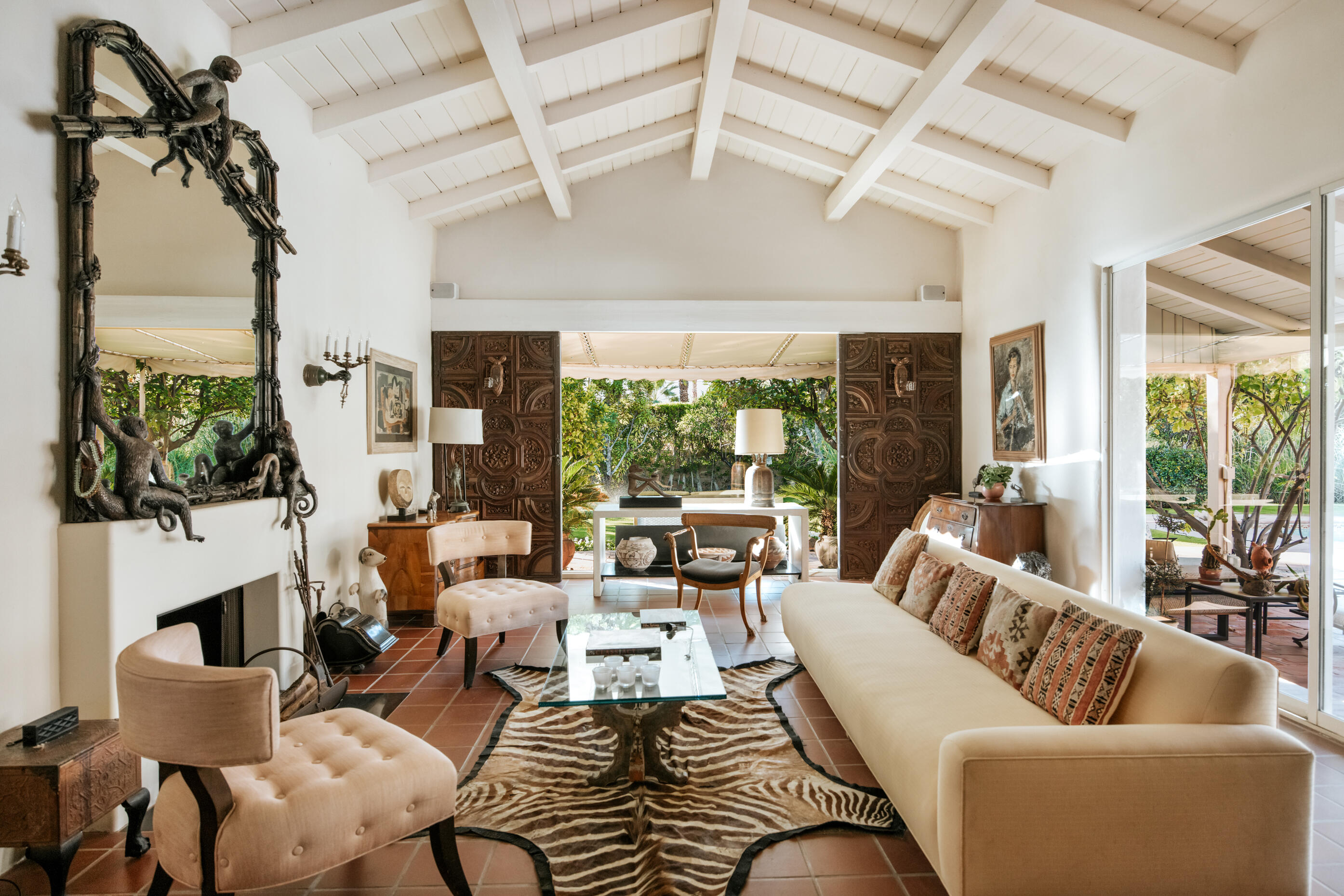 1050 North Cahuilla Road Palm Springs, CA 92262 - Photo 7 of 32 a living room with patio fireplace furniture and a floor to ceiling window