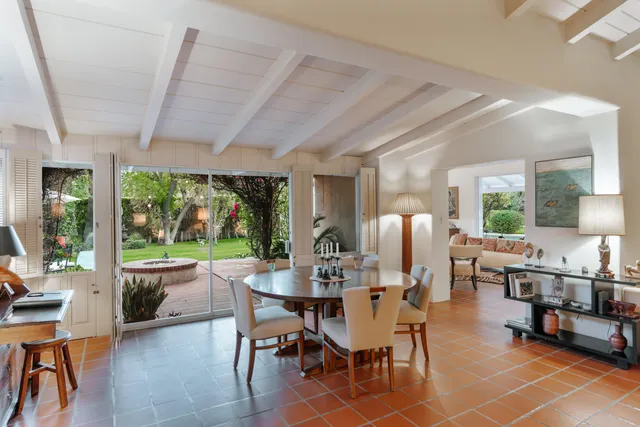 a view of swimming pool with outdoor seating