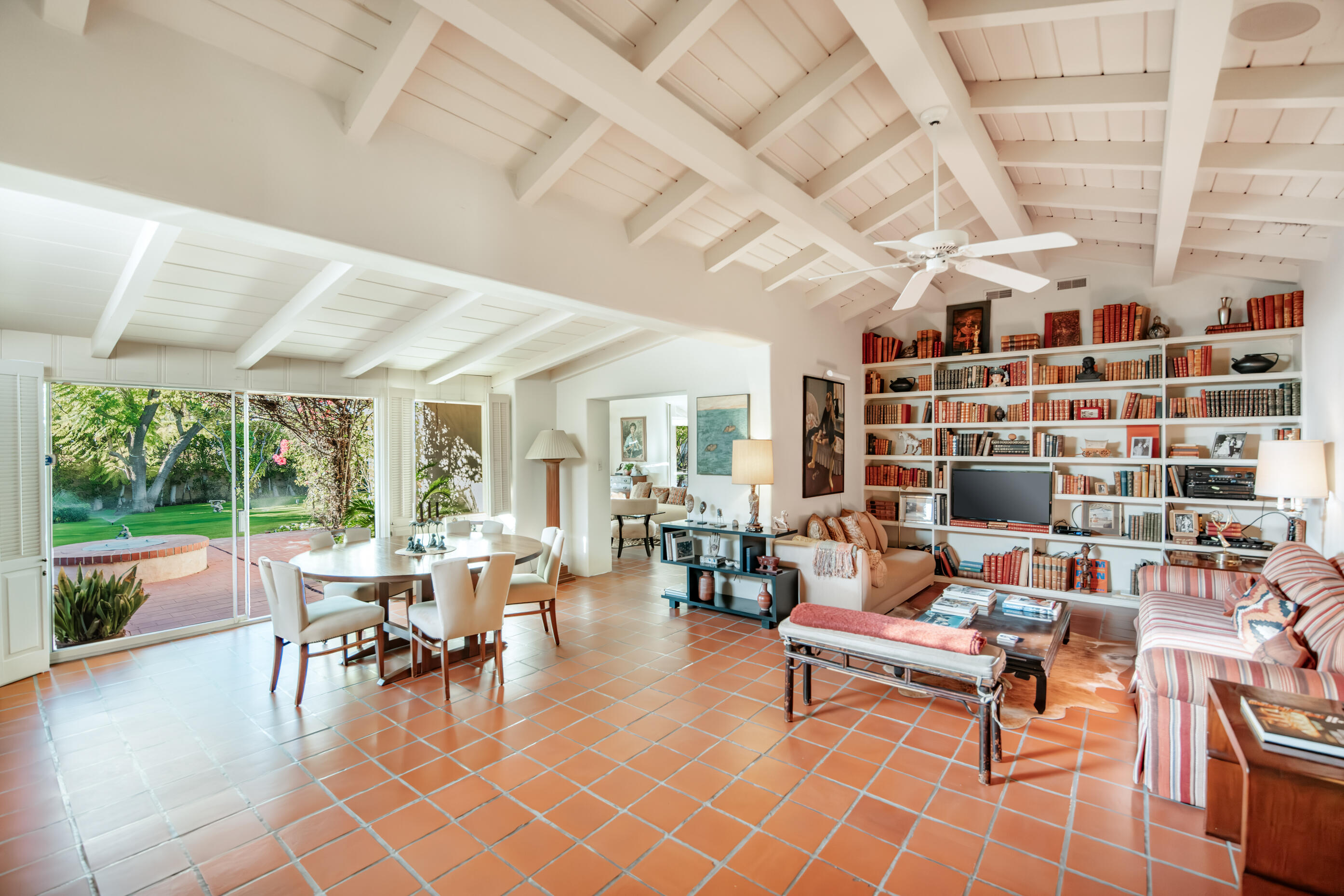 1050 North Cahuilla Road Palm Springs, CA 92262 - Photo 9 of 32 a living room with furniture and a floor to ceiling window