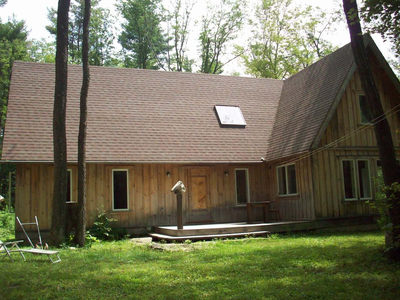 29 Becket Road Hinsdale, MA 01235 - Photo 8 of 41 a backyard of a house with lots of green space