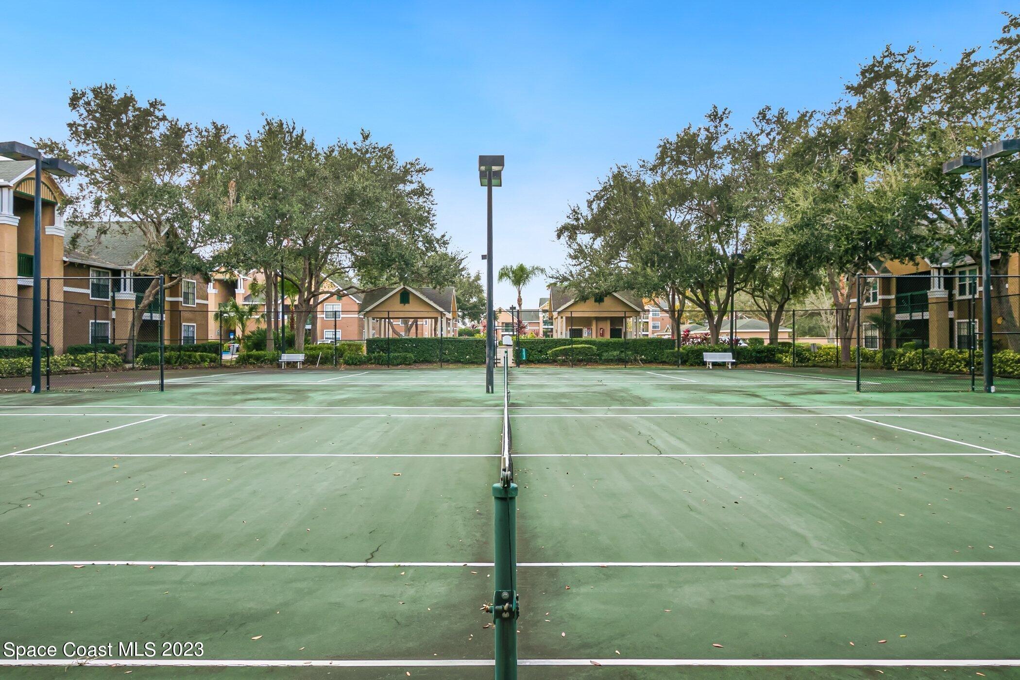 7667 North Wickham Road, Unit 218 Melbourne, FL 32940 - Photo 25 of 35 a view of a tennis court