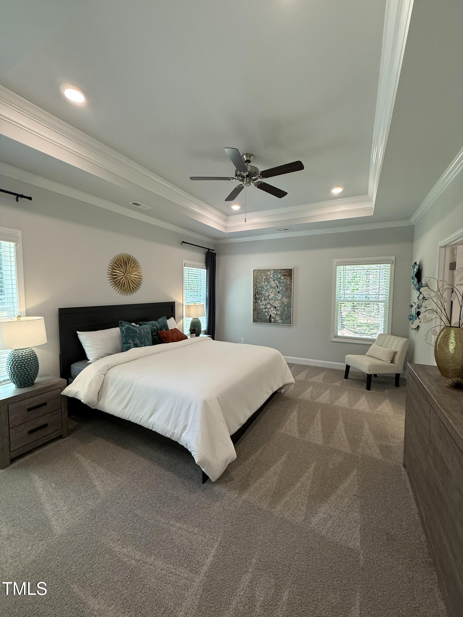 30 Lemon Drop Lane Louisburg, NC 27549 - Photo 12 of 21 a bedroom with a bed couch and window