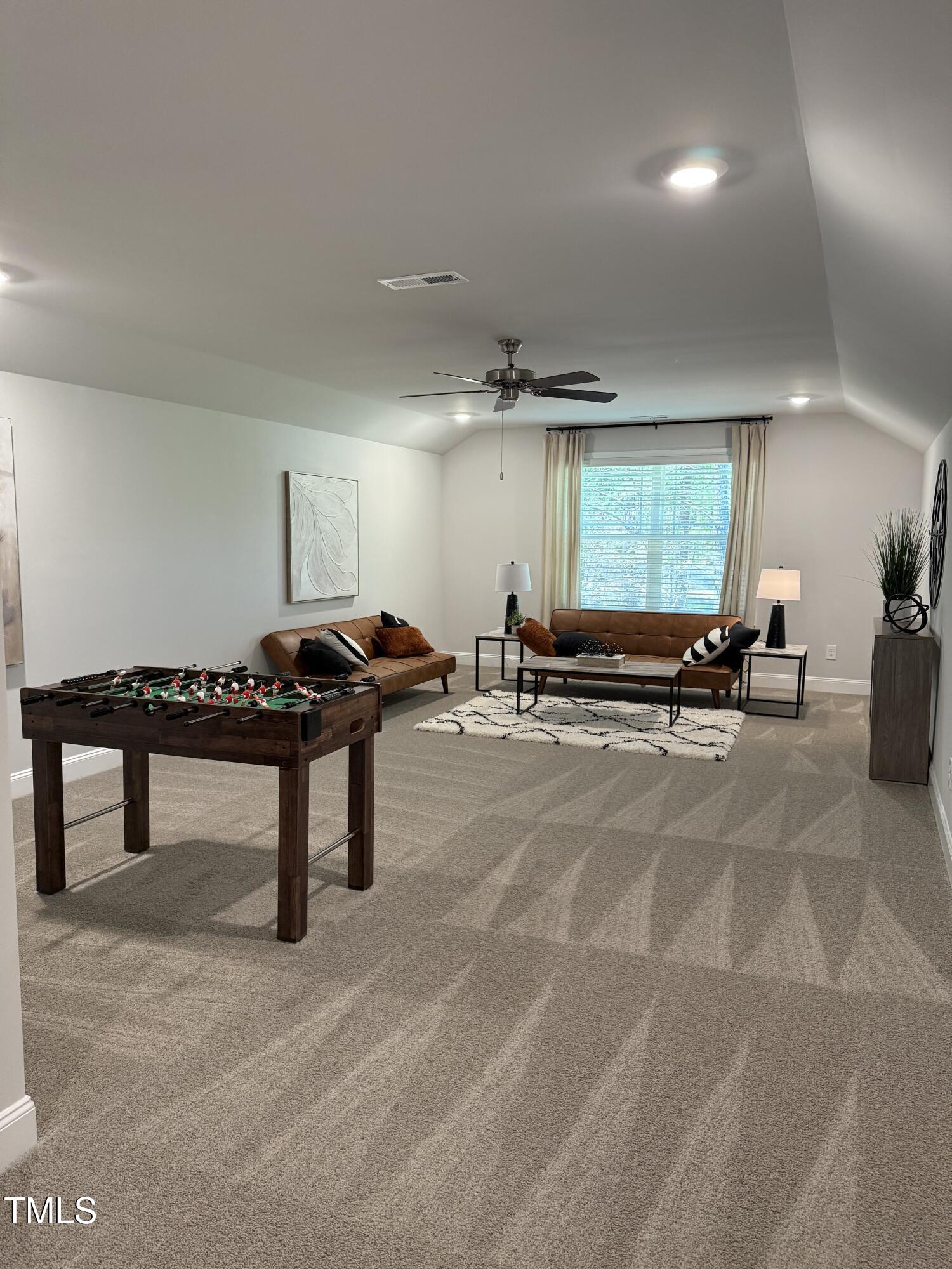 30 Lemon Drop Lane Louisburg, NC 27549 - Photo 14 of 21 a view of a room with gym equipment