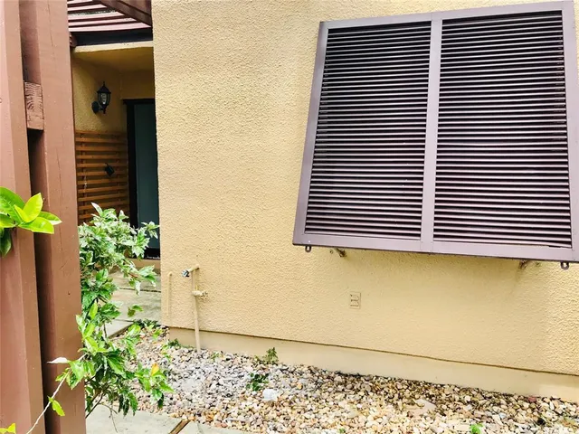 a view of a building from a lake
