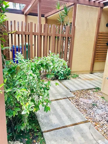 a view of a garden of the pathway