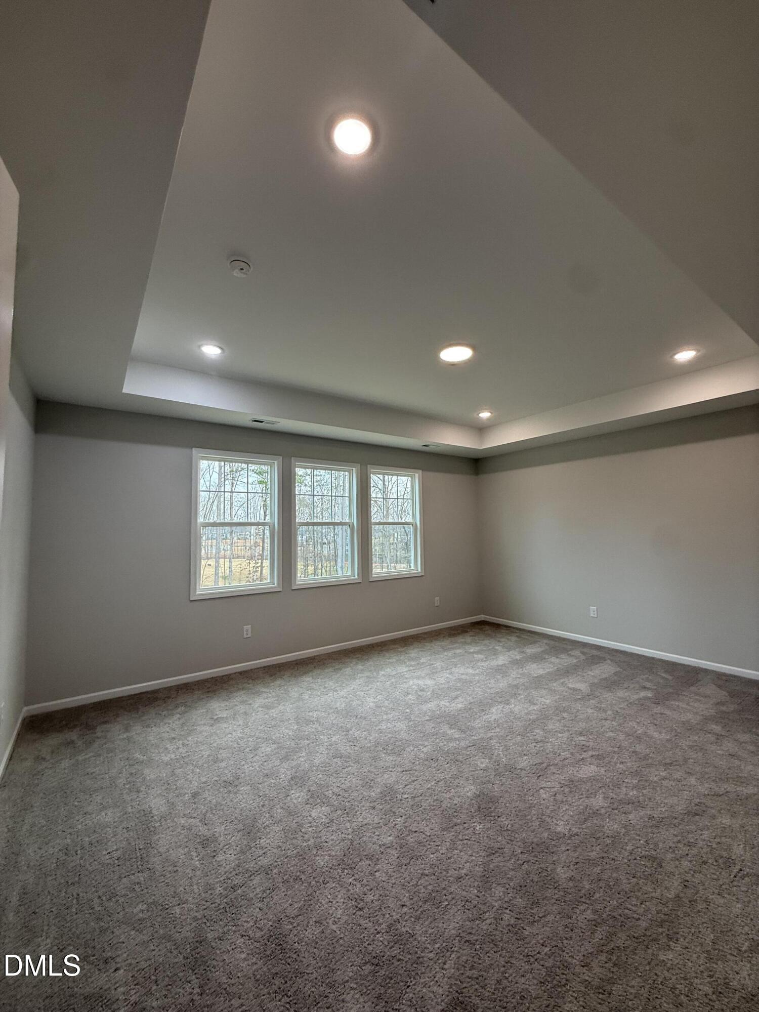 2429 Picual Way Apex, NC 27502 - Photo 11 of 21 an empty room with windows
