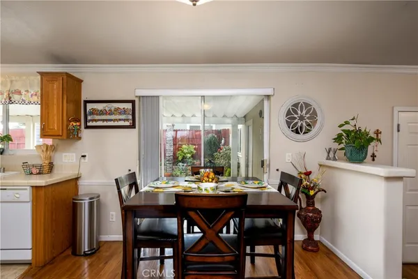 a kitchen with a sink and refrigerator
