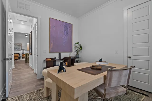 a kitchen that has a table and chairs in it