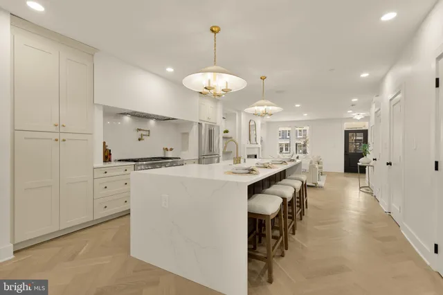 a close view of stove top oven and refrigerator