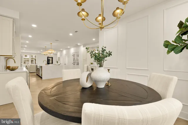 a bathroom with a granite countertop sink double and mirror
