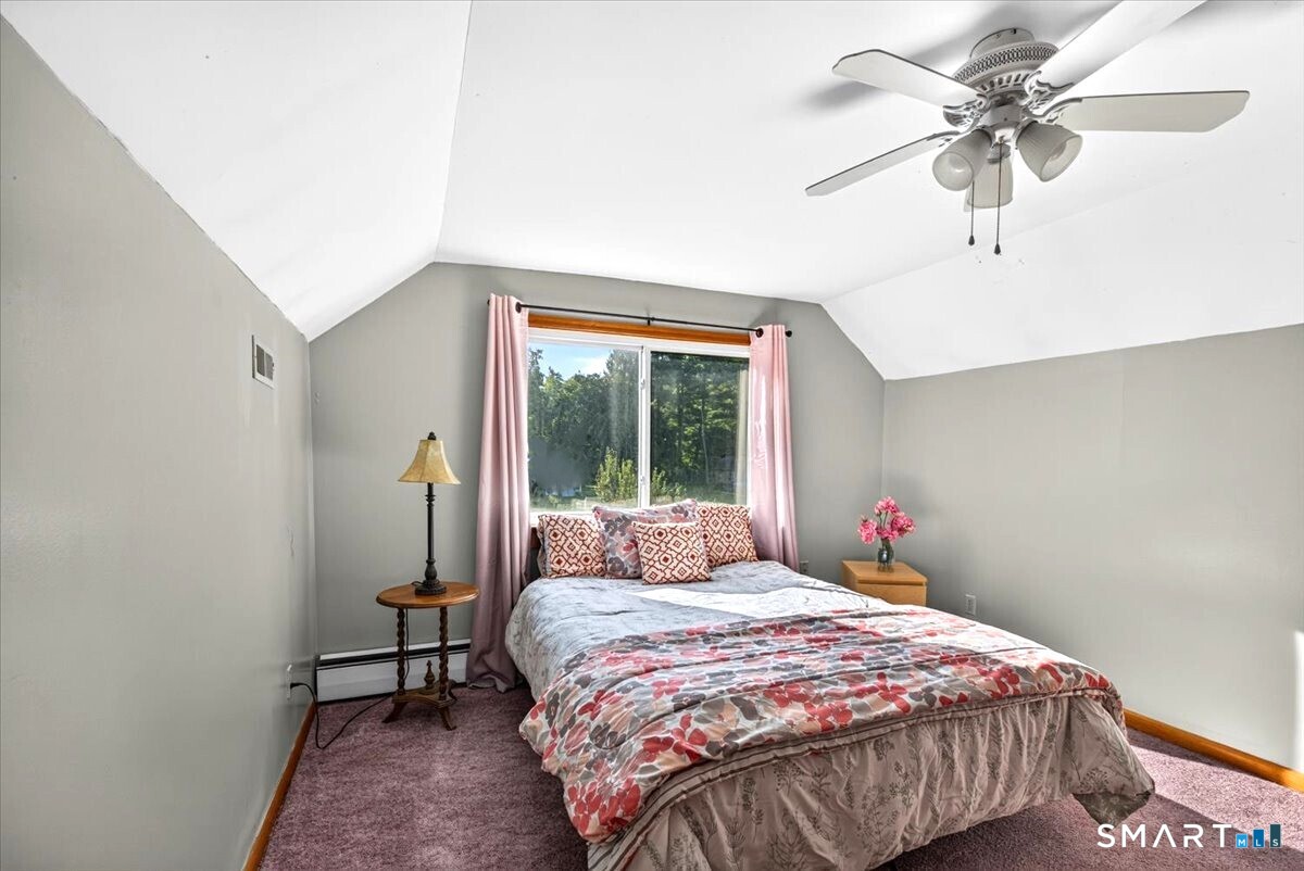 121 Hartford Road Simsbury, CT 06070 - Photo 21 of 31 Spacious second-floor fourth bedroom also featuring a large closet and oversized window that brings in plenty of natural light.