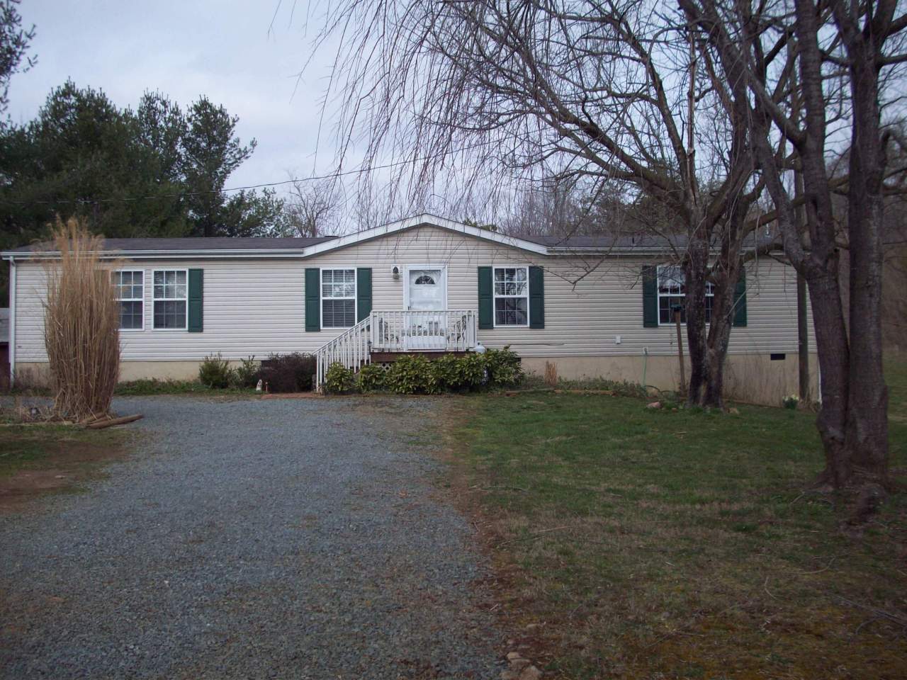 a house with trees in the background