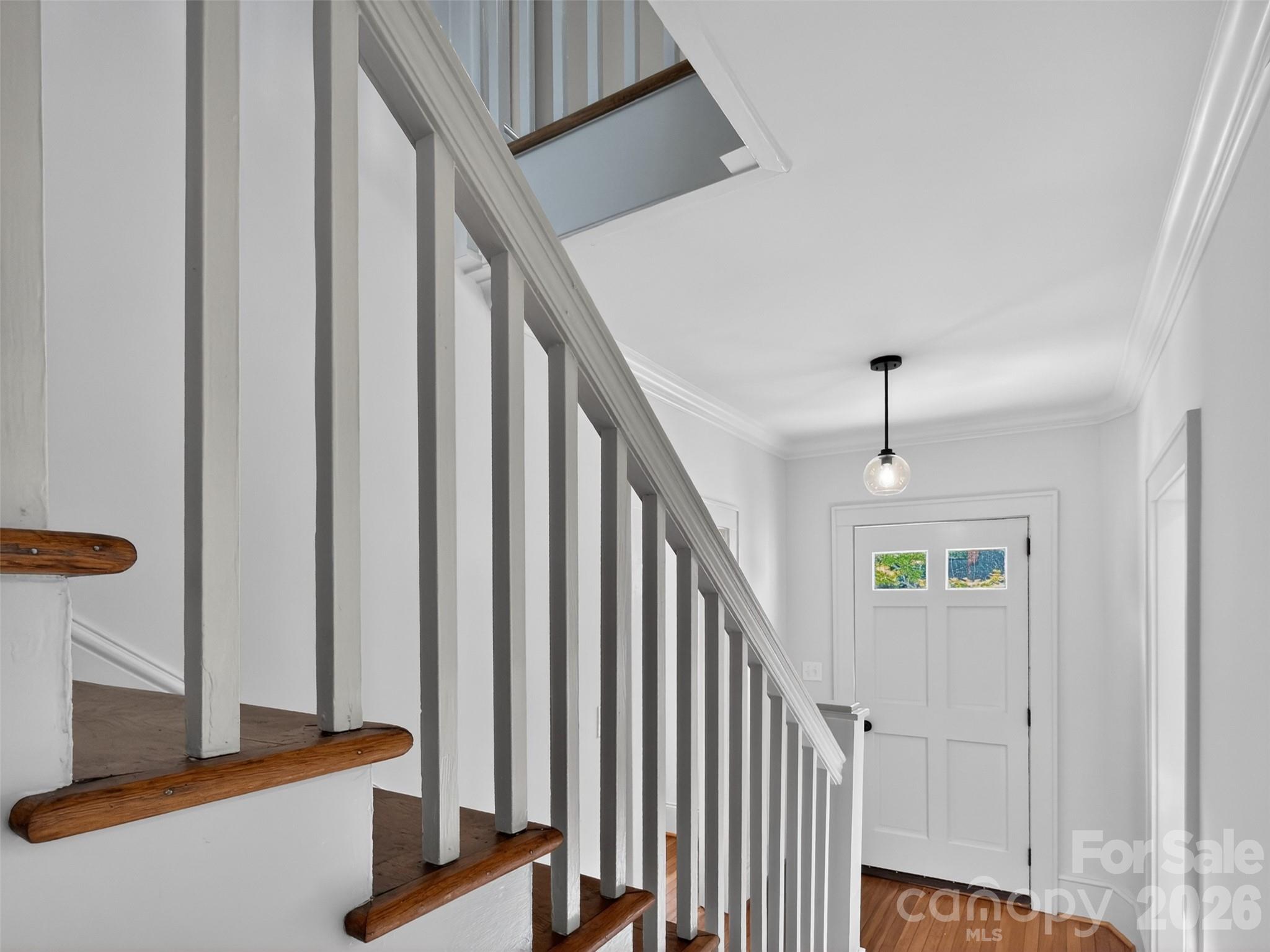 262 Pleasant Street Spindale, NC 28160 - Photo 19 of 37 a view of an entryway with staircase