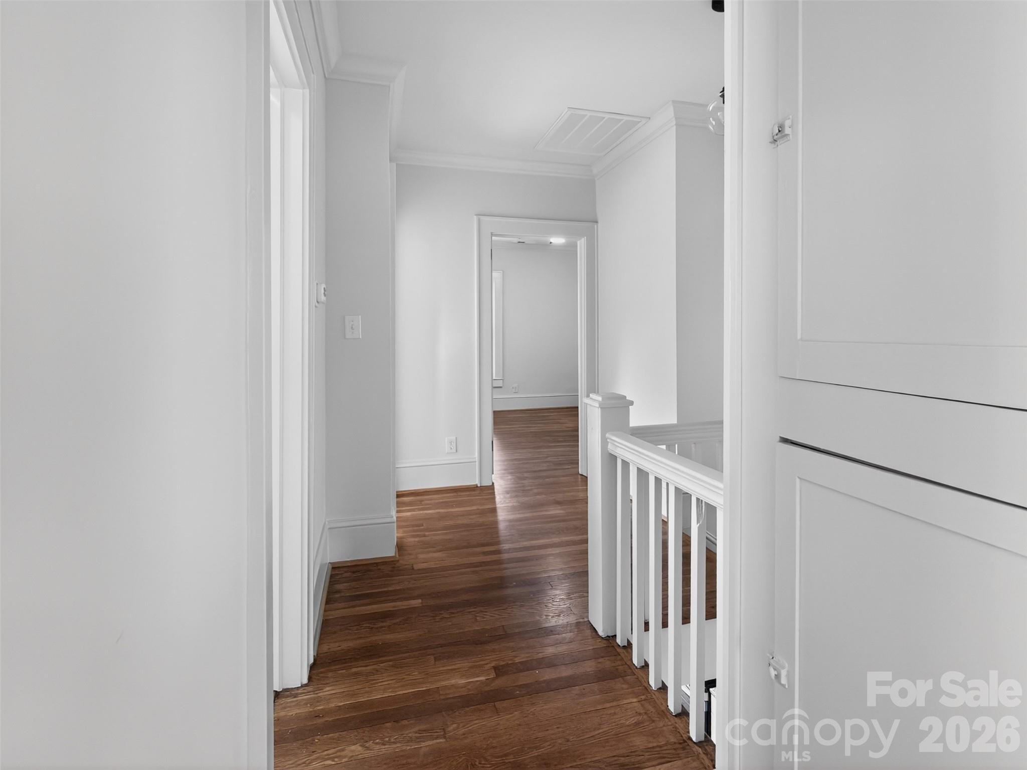 262 Pleasant Street Spindale, NC 28160 - Photo 24 of 37 a view of a hallway with wooden floor and staircase