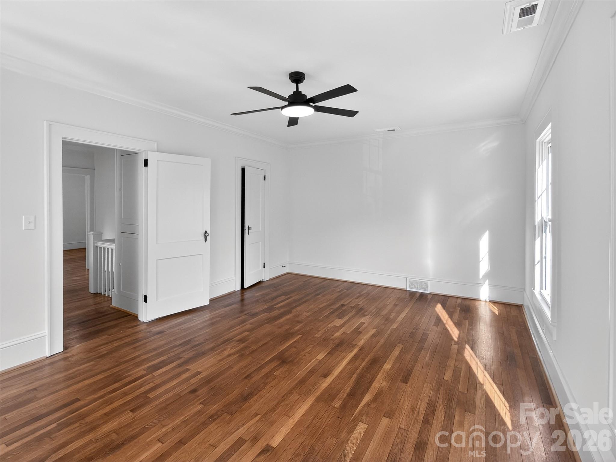 262 Pleasant Street Spindale, NC 28160 - Photo 27 of 37 a view of empty room with wooden floor