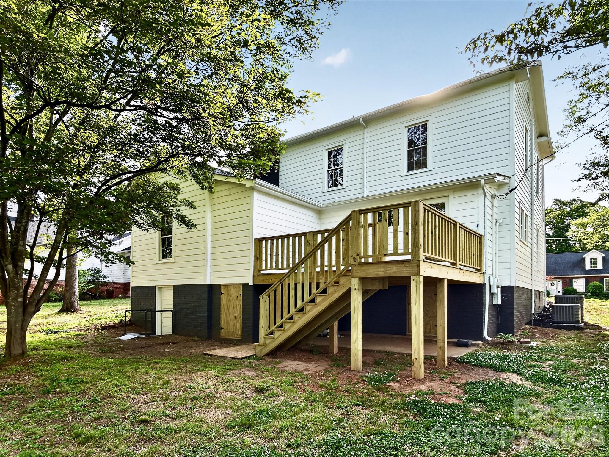 262 Pleasant Street Spindale, NC 28160 - Photo 4 of 37 a view of house with a yard