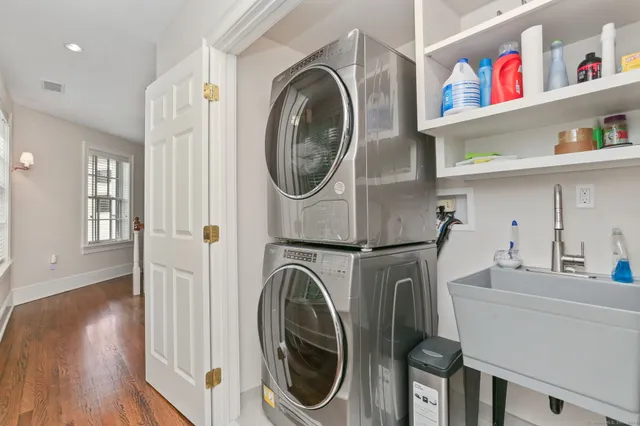 a view of a hallway with washer and dryer