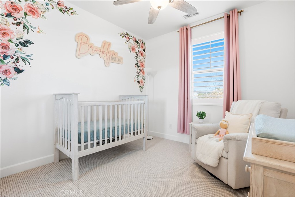 135 Medano Street Rancho Mission Viejo, CA 92694 - Photo 33 of 67 a bed room with a bed and a window