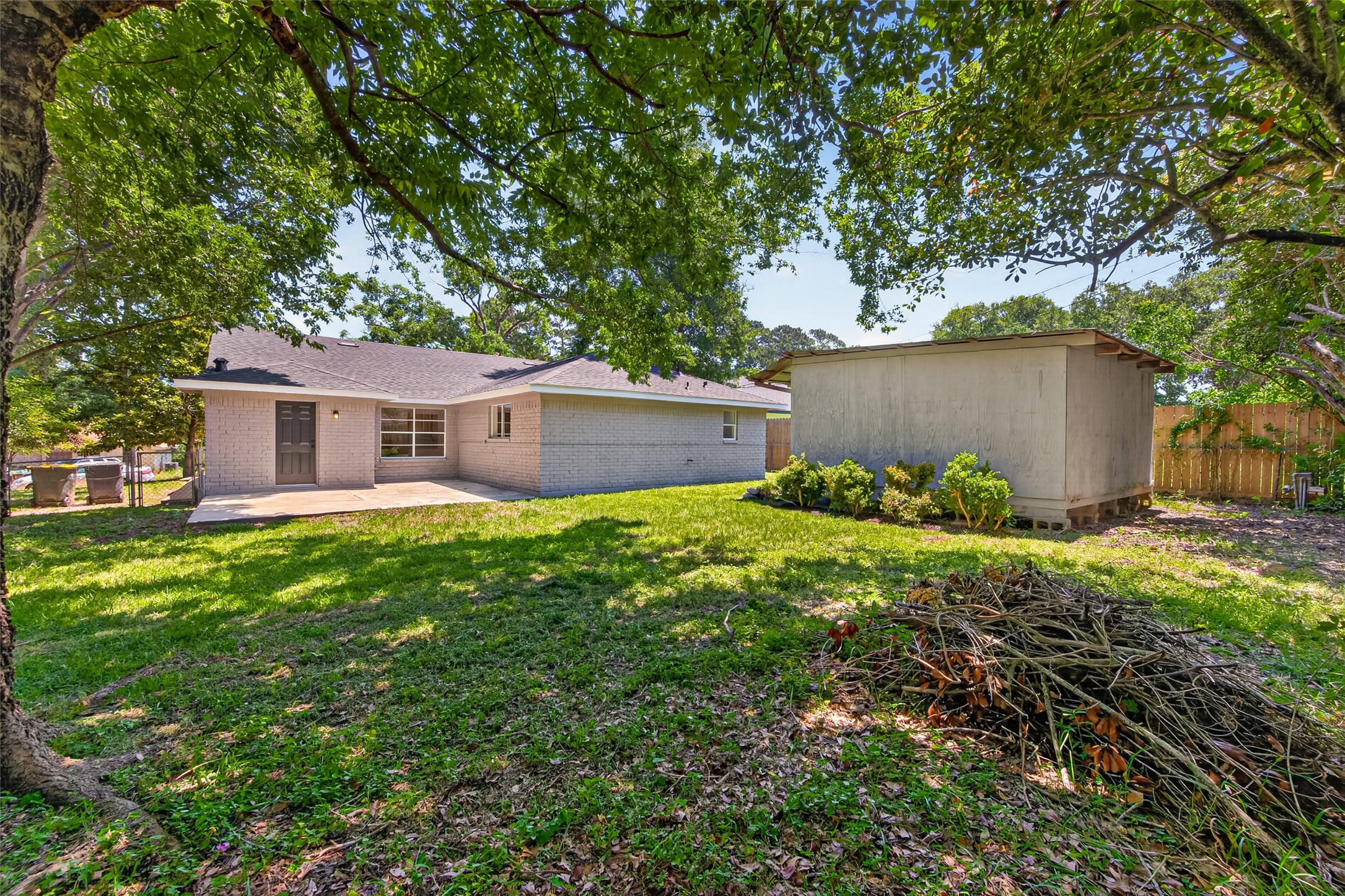 503 Allison Street Conroe, TX 77303 - Photo 31 of 34 Expansive backyard perfect for outdoor activities.