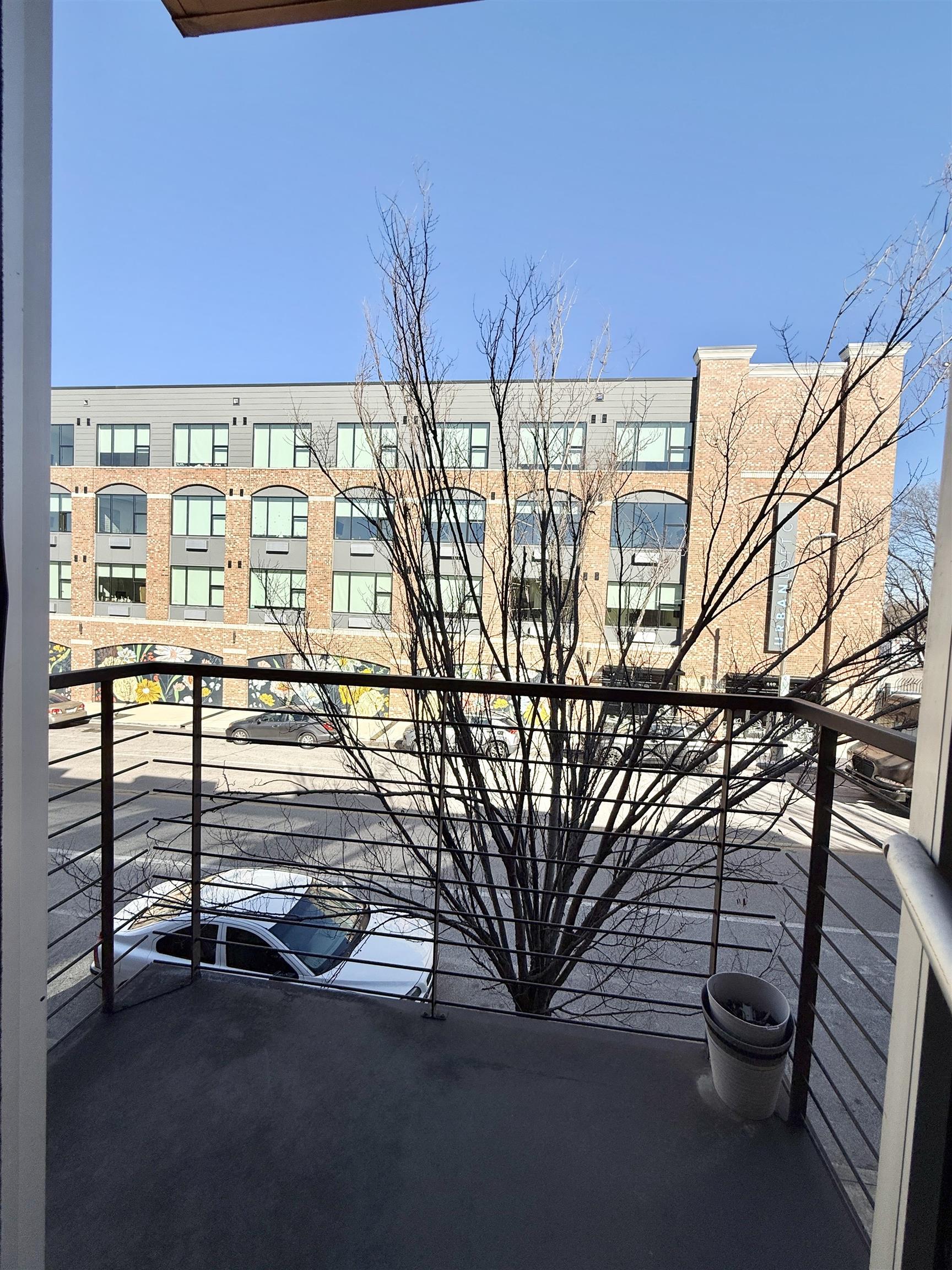 449 Monroe Avenue, Unit 104 Memphis, TN 38103 - Photo 11 of 24 a view of a balcony with staircase