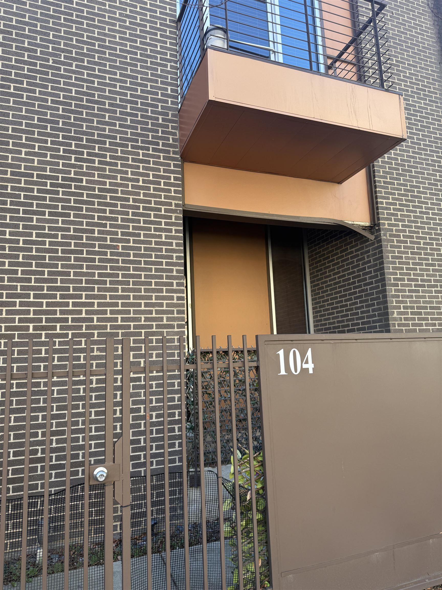 449 Monroe Avenue, Unit 104 Memphis, TN 38103 - Photo 20 of 24 a view of a brick wall