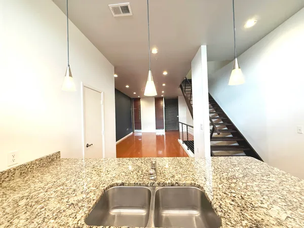 a bathroom with a sink and mirror