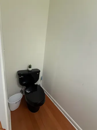a bathroom with a toilet and a sink