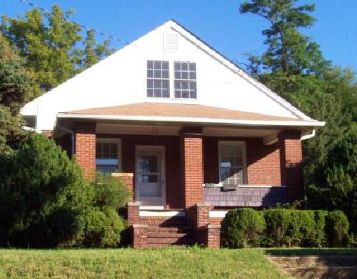 2631 Webster Road Blue Ridge, VA 24064 - Photo 1 of 1 a front view of a house with garden