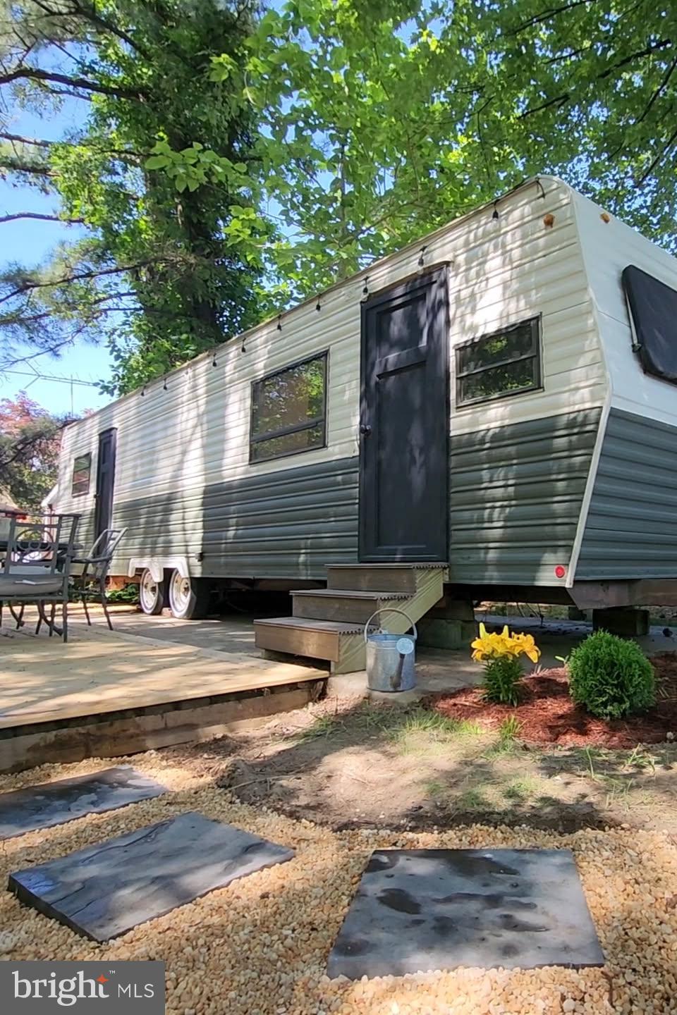 189 Black Fish Lane, Unit GLEN 4 Earleville, MD 21919 - Photo 2 of 2 a view of street along with house and trees