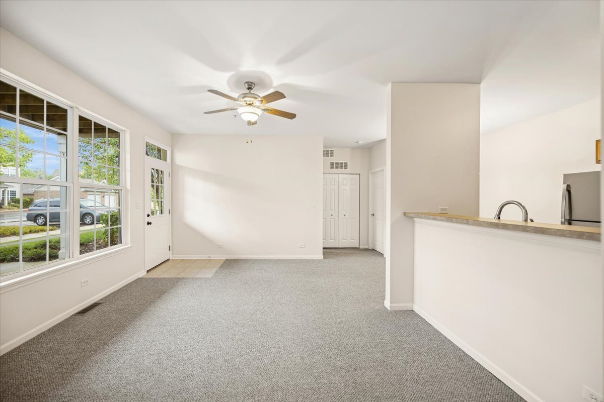 4439 Timber Ridge Court Joliet, IL 60431 - Photo 9 of 17 a view of an empty room with a window