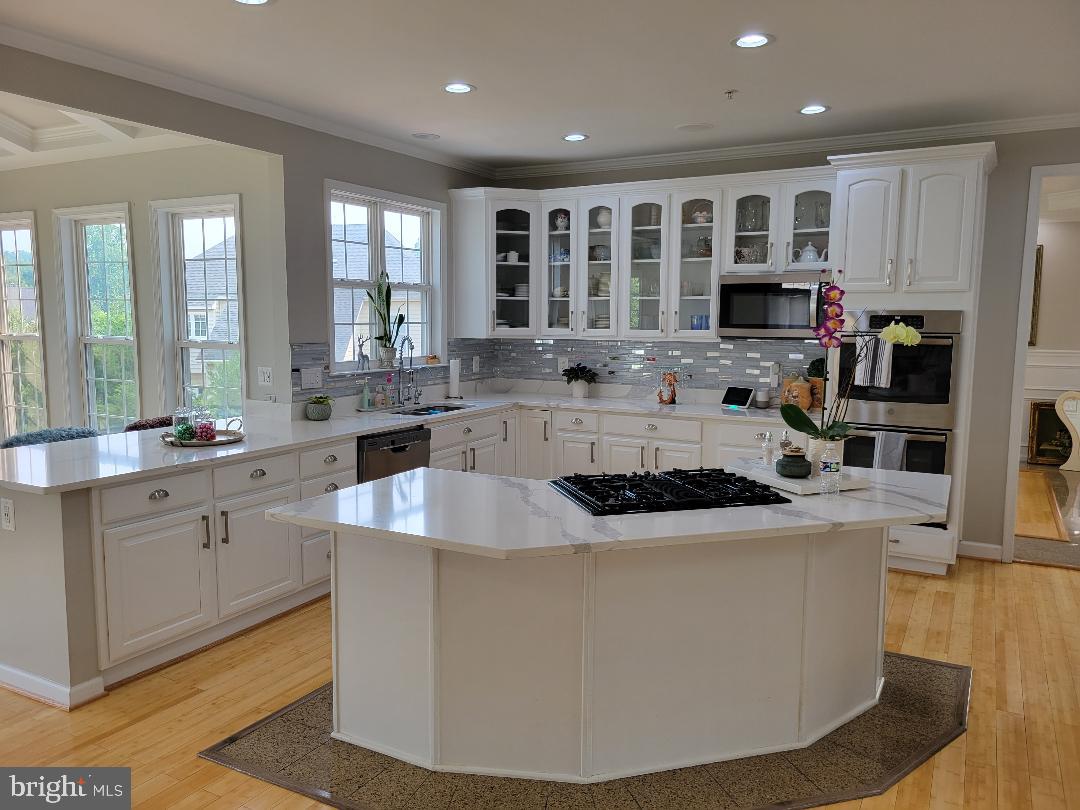 7606 Killbarron Drive Laurel, MD 20707 - Photo 11 of 63 Cooktop with down draft exhaust