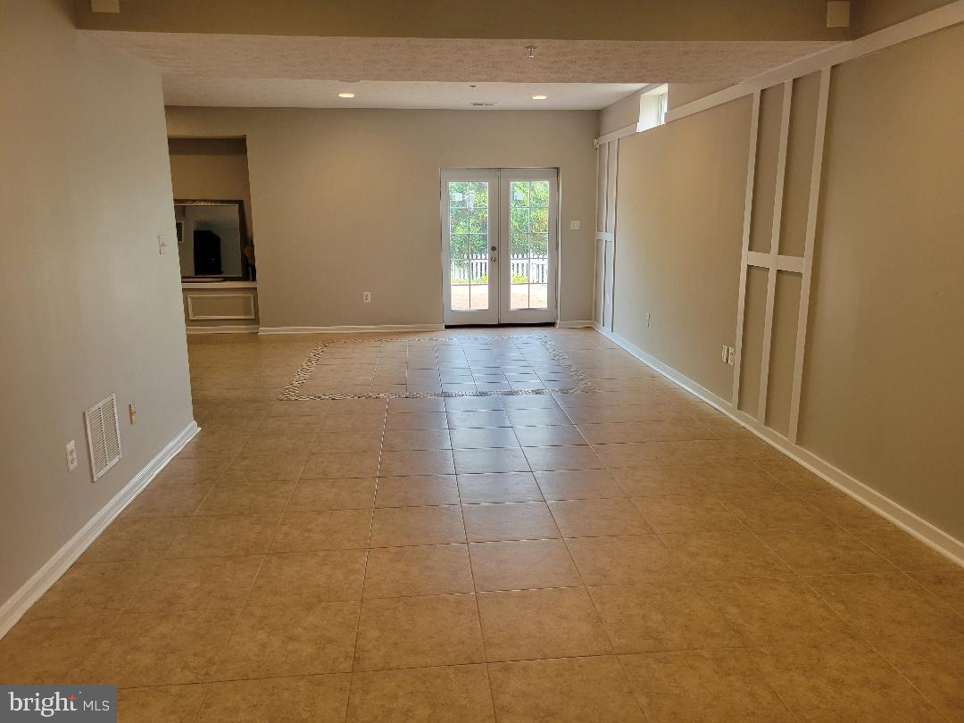 7606 Killbarron Drive Laurel, MD 20707 - Photo 48 of 63 Another view of Rec. room with exit