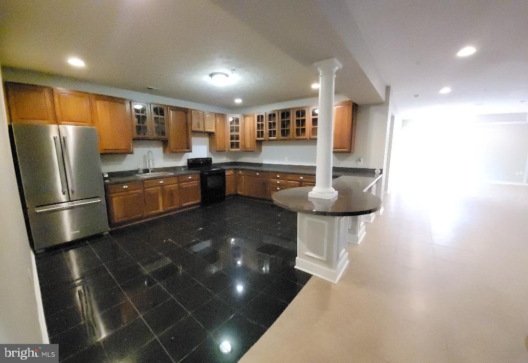 7606 Killbarron Drive Laurel, MD 20707 - Photo 56 of 63 Basement kit. with breakfast bar