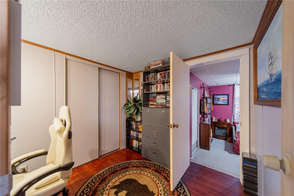 1381 Southeast Lake Road Arcadia, FL 34266 - Photo 11 of 38 a view of an entryway with wooden floor