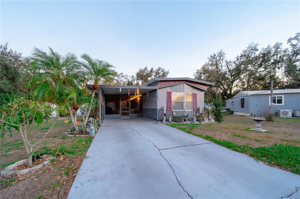 1381 Southeast Lake Road Arcadia, FL 34266 - Photo 24 of 38 a view of a house with a patio