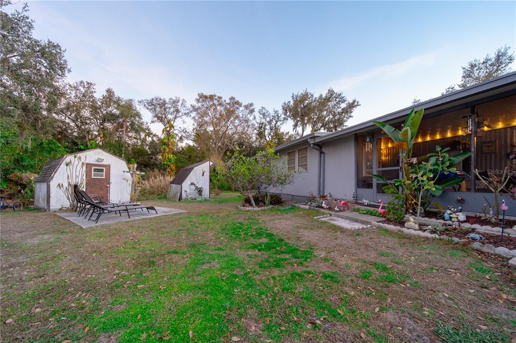 1381 Southeast Lake Road Arcadia, FL 34266 - Photo 27 of 38 a view of a house with backyard and sitting area