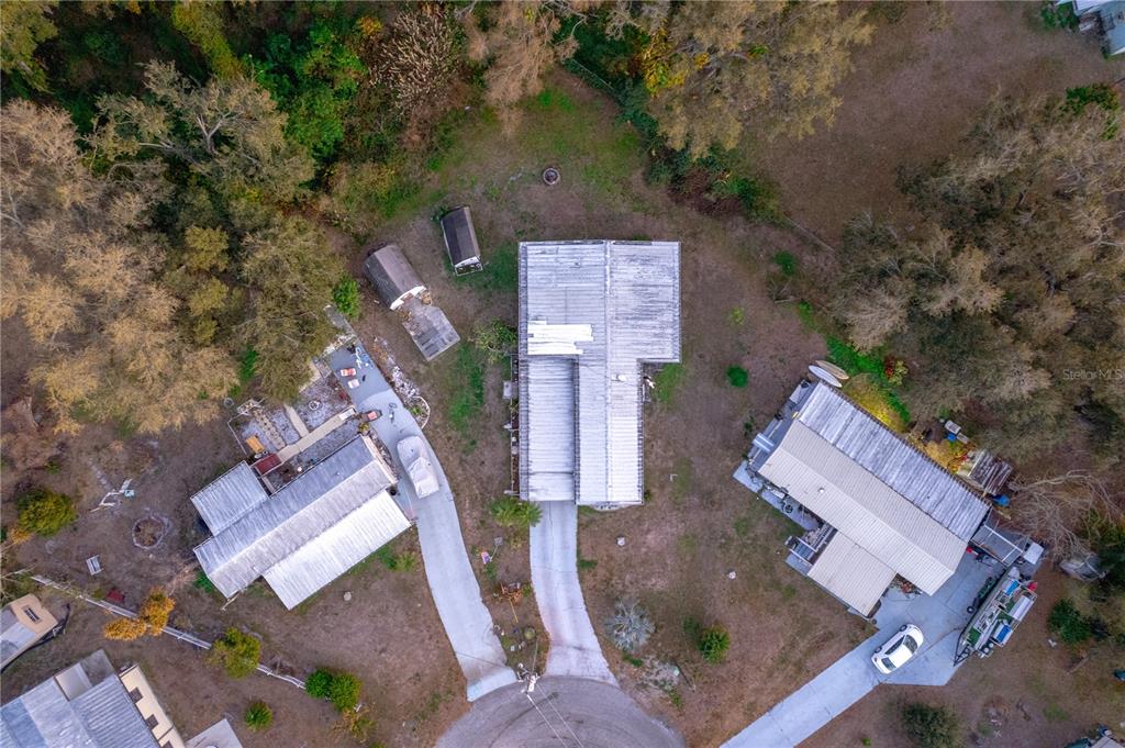 1381 Southeast Lake Road Arcadia, FL 34266 - Photo 35 of 38 an aerial view of houses with outdoor space