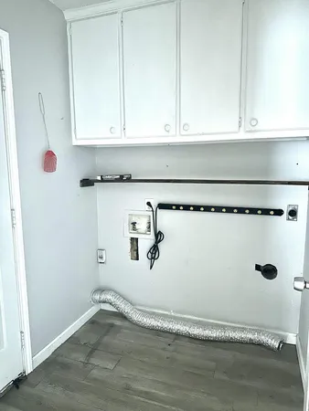 a view of a utility room with racks on the wall