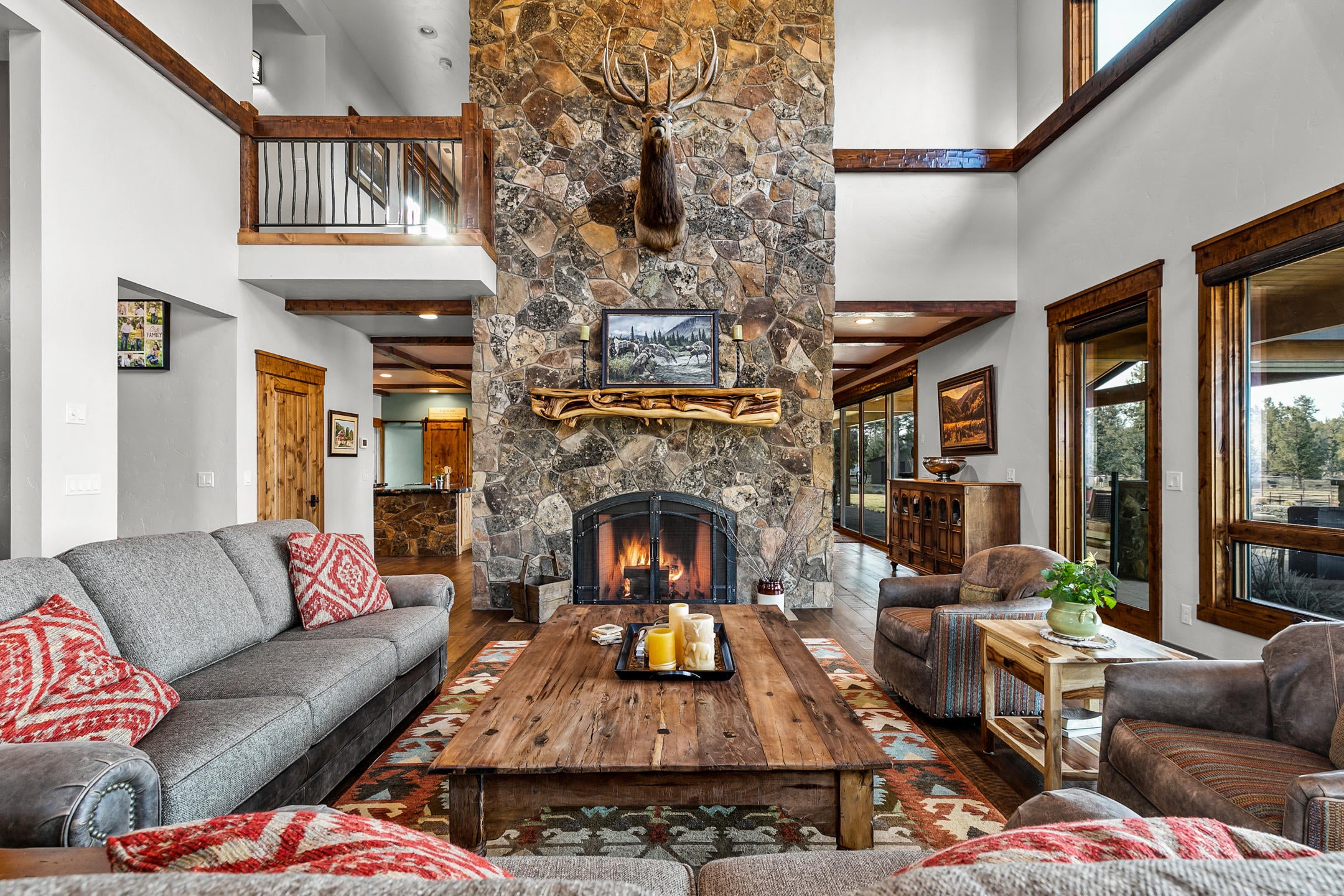 69580 Goodrich Road Sisters, OR 97759 - Photo 12 of 38 Montana moss stone fireplace with local artisan made mantel
